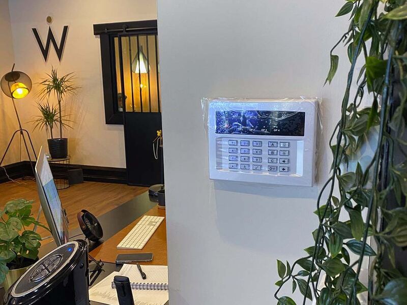 Alarm keypad on a wall
